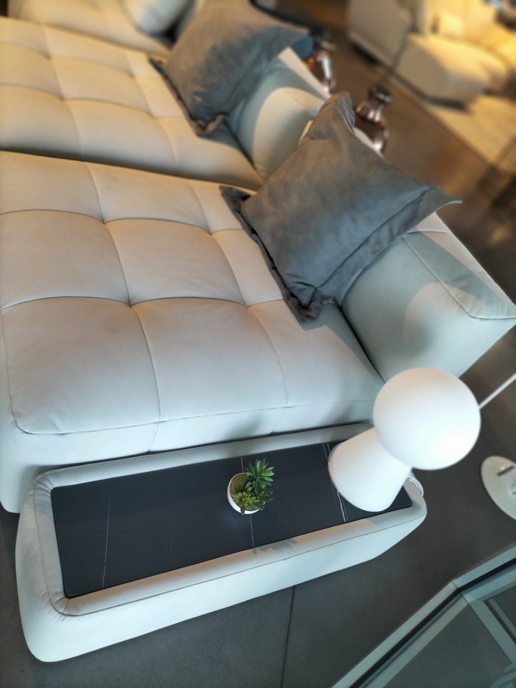 Divano modulare in pelle con tavolino e top in gres